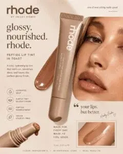 Aesthetic promotional ad for Rhode Peptide Lip Tint featuring lip gloss tube product shots and model imagery with text "glossy. nourished. rhode."